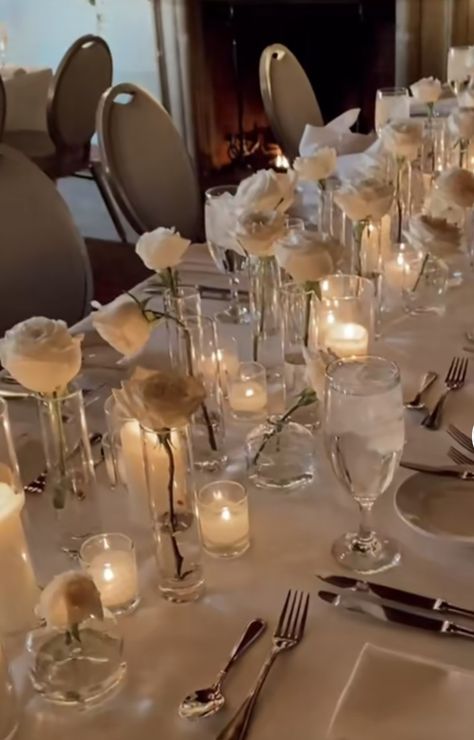 Candle And Rose Centerpieces Wedding, Minimalist White Rose Centerpiece, Single Rose Table Centerpiece, Long Stem Rose Centerpiece Wedding, White Candles Wedding Table, Single Roses Centerpieces, Candles Wedding Reception Table, Wedding Table Decorations White Roses, Candle And Roses Centerpieces