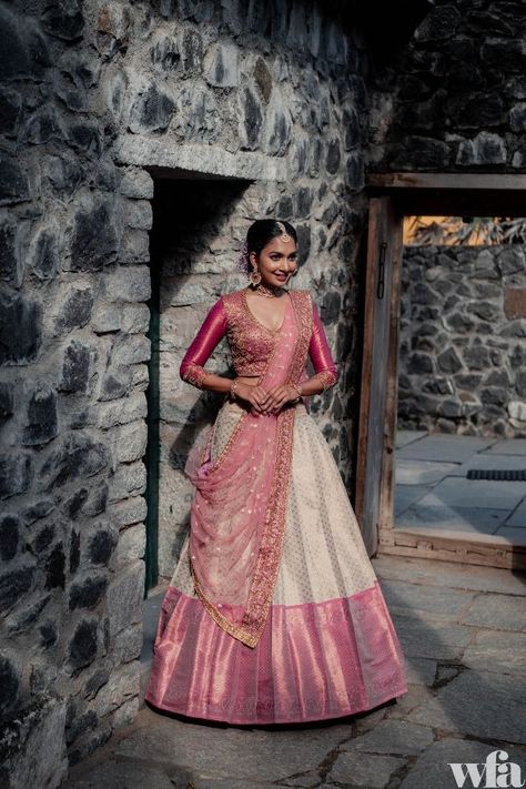 10+ Best Bridal Lehenga Stores In Chennai – Check It Out! - SetMyWed South India Lehangas, Pleated Lehenga Indian Weddings, Half Saree Modern Style, Saree To Half Saree Designs, Half Saree Voni Designs, Half Saree Styles Traditional, Pink And White Half Saree, Pleated Half Saree, Reshme Saree Lehenga