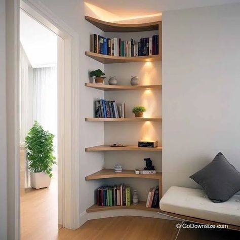 This traditional home showcases radial corner shelves that store books and puts them on a classy display. Book Shelves In Bedroom, Stacked Tile Backsplash, Decorate Empty Wall, Stacked Tile, Tile Backsplash Ideas, Home Office Built Ins, Corner Wall Shelves, Small Home Offices, Bedroom Corner