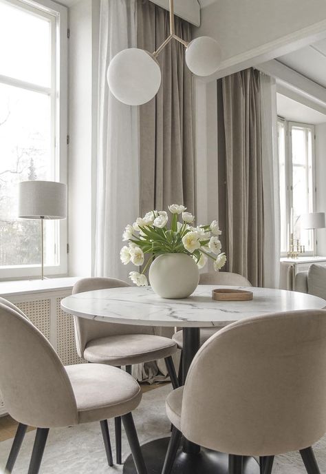 Home tour | Soft, neutral decor in Finland | These Four Walls Dining Chairs With Marble Table, Circular Dining Table Rug, Circle Marble Dining Table, Marble Round Dining Table Decor, Marble Table With Chairs, Round Marble Kitchen Table, Round Dining Table Candle Decor, Beige Chairs Dining, Neutral Dining Room Round Table