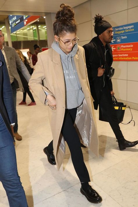 7 Really Comfortable-Looking Pieces Celebs Always Wear to the Airport Celebrities, Trousers, Walking, Celebrity Airport Outfit, Travel Outfit, Beautiful Pictures, Trench Coat, Shopping Outfit, A Woman