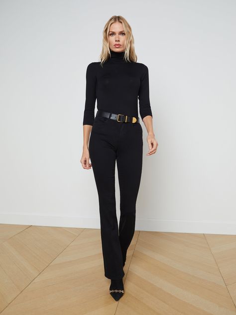 A classic high-rise bootcut jean in true-black. Contoured waistband fits securely at natural waist, then hugs from hip to knee before releasing into a slim bootcut hem. High-recovery super stretch holds its shape, smoothing the figure without sacrificing comfort. Classic five-pocket construction and zip fly closure. | L'AGENCE Selma Bootcut Jean In Noir Black Bootcut Pants Outfit, Black Bootcut Jeans Outfit, Bootcut Jeans Outfit, Bootcut Trousers, Trousers Outfit, Closet Wishlist, High Rise Bootcut Jeans, Button Outfit, Bootcut Jean