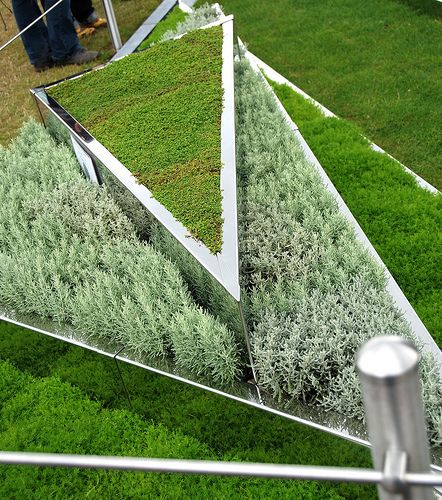 Triangular Greens Triangular Landscape Design, Garden Pyramid, Triangular Architecture, Decor Business Ideas, Home Decor Business Ideas, Pyramid Planter, Home Decor Business, Hampton Court Flower Show, Garden Screen