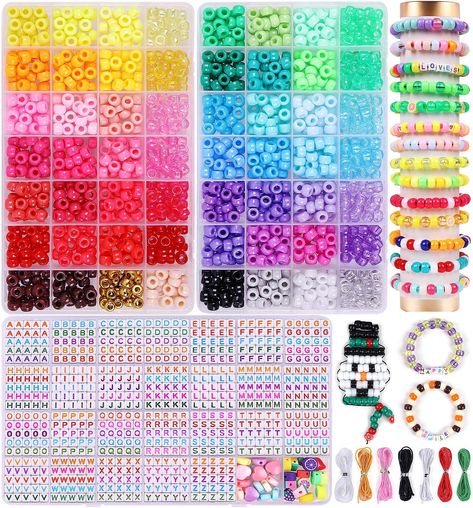 PRICES MAY VARY. 🚀Upgraded Kandi Bracelet Kit: Wuollgess pony beads for bracelets contains upgraded 28 Compartment 2 boxes of kandi beads in 56 unique colors, about 1000pcs A to Z letter beads, 20pcs round colorful heart beads, 20pcs colorful fruit beads, 6 colors nylon strings and 2 crystal strings, 1 scissor and tweezer. ☃️Rich and Special Colors: These pony beads kit have 56 different colors, including a variety of vibrant primary colors, pastel colors, and metallic colors, transparent, pear Kandi Christmas, Rainbow Kandi, Fruit Beads, Friendship Bracelet Kit, Kandi Beads, Beads Kit, Bracelet Making Kit, Pony Bead Bracelets, Making Friendship Bracelets