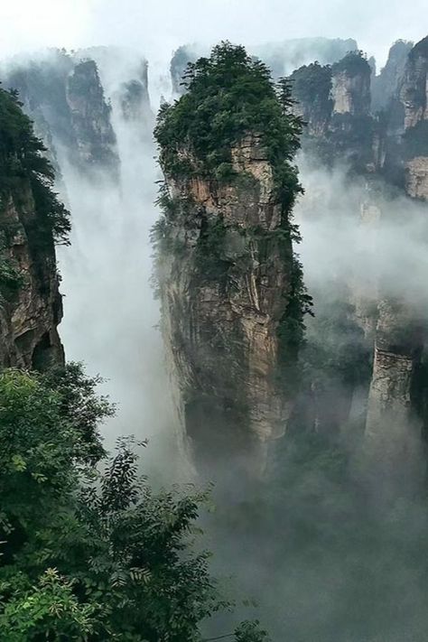 Here is the Mount Hallelujah in the ‘Floating Planet’ of the movie Avatar. Go to www.chinatraveldestination.com to know more about Zhiangjiajie, China. China Floating Mountains, Floating Mountains China, Guilin Mountains China, Yellow Mountains China, China Mountains, Avatar Mountains, China Scenery, Floating Mountains, Cliff Landscape