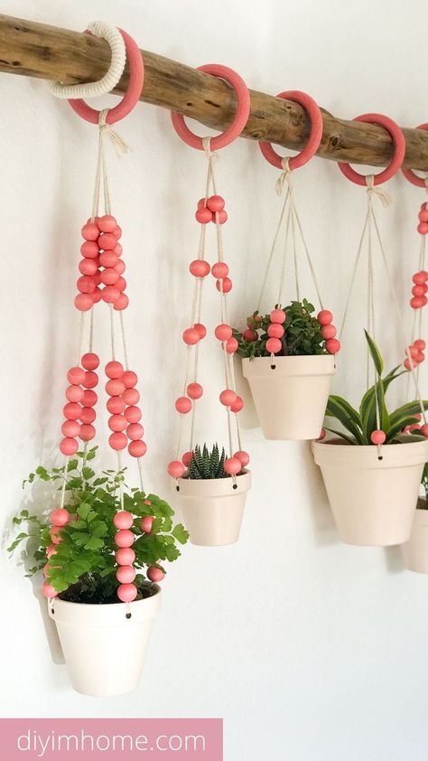 How to make this beautiful DIY hanging planter display. The full tutorial is available in this post. A great DIY home decor project for your home, office, or retail space! DIY Hanging Planters DIY Hanging Planter Indoor DIY Hanging Planter Easy DIY Hanging Planter Decor DIY Hanging Planter Design Diy Hanging Wall Planter, Hanging Planters Diy, Macrame Hanging Plants, Diy Hanging Planters, Planters Diy, Planter Decor, Indoor Plant Wall, Diy Hanging Planter, Eating Table