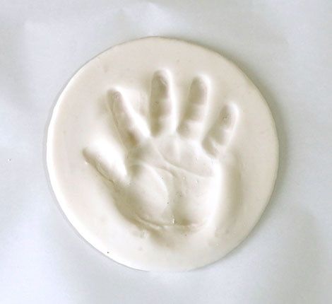 Keepsake Craft: Baking Soda Clay Handprint Ornaments | Play | CBC Parents Christmas Ornaments Handprint, Baking Soda Clay, Clay Handprint, Handprint Ornaments, Keepsake Crafts, Homemade Clay, Baby Handprint, Baking With Kids, Clay Food