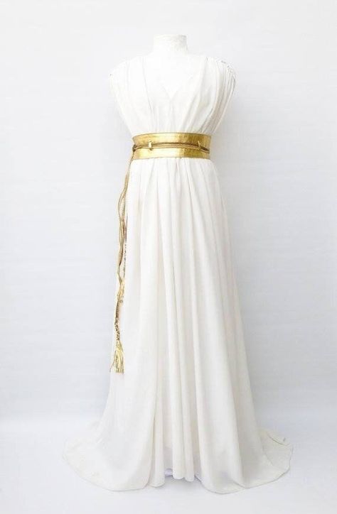 The Grecian Dress This Greek Goddess dress has a two layer  chiffon and satin You can wear this dress at special events SIZING This  dress is one size which fits S, M and L.  It has a golden belt around the waist to adjust the sizing.  Please keep in mind that all body types are different and people with the same measurements can look drastically different in the same garment.  If you would like to change the length of the slits, we can customize them for you. For Sizing, contact us for further Greek Custome Woman, White Greek Goddess Dress Aesthetic, Greek Mythology Outfits Goddesses, Greek Mythology Costumes Goddesses, Greek Goddess Dress Aesthetic, Greek Toga Woman, Greek Outfit Ideas Goddesses, Greek Dress Goddesses, Roman Outfits