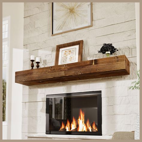 PRICES MAY VARY. A Touch of Refinement — Accessorize your living room with a stately wood mantle mount. The shelf wood rustic brown finish and sleek lines of this fireplace shelf 72 inch creates a grounding sense of richness to your space Special Spotlight — The proudest and most precious moments of your life deserve a beautiful seat in your home. These fireplace mantels shelves have an 8 inch deep shelf, making 72 inch shelf the perfect spot to display your family photos, awards and artwork A W Mantle Shelves, Fireplace Mantle Shelf, Floating Fireplace Mantel, Wood Fireplace Mantels, Wood Mantle Fireplace, Floating Fireplace, Rustic Fireplace Mantels, Fireplace Mantel Shelf, Wood Mantle