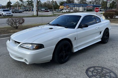 While the standard 1998 Mustang SVT Cobra produces 305hp, the supercharger bolted to this car should provide a noticeable power boost. #Ford, #Mustang, #SvtCobra 1998 Mustang, 1998 Ford Mustang, Cobra Car, Mustang Car, Ford Mustang Cobra, Car Scene, Ford Mustang Coupe, Best Barns, Ford Mustang Car