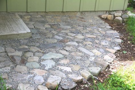 embedded river rock with a gravel finish to fill in cracks Rock Patio Ideas Backyards, Rock Patio Ideas, River Rock Patio, Natural Stone Patio, Rock Patio, Rock Walkway, Diy River Rock, Rock Pathway, River Rock Landscaping