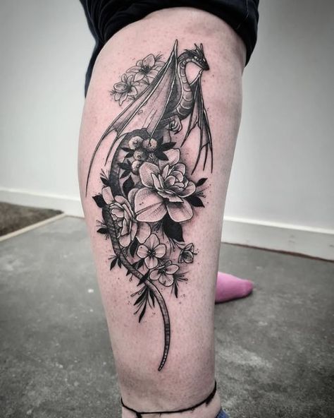 Little Red Tattoos on Instagram: "Floral dragon calf piece 🌿 . . . . . . . . . . . . . . . . . . . . . . #tattoo #design #tattoodesign #legtattoo #calftattoo #calfpiece #black #blacktattoo #floral #floraltattoo #floraldesign #flowers #flowertattoo #floraldragon #floraldragontattoo #dragon #dragontattoo #dragondesign #pretty #prettytattoo #whiteink #whitehighlights #tattooartist #littleredtattoos" Little Red Tattoos, Back Of Calf Tattoos For Women Calves, Dragon Calf Tattoo, Side Calves Tattoos For Women, Calf Tattoos For Men, Dragon Tattoo Leg, Calf Tattoos For Women, Simple Leg Tattoos, Calf Tattoo Men