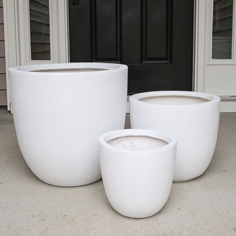 white concrete outdoor planters from Amazon that are lightweight and budget friendly Large White Pots Outdoor, Large White Planters Outdoor, Planter Size Guide, White Outdoor Planters Front Door, White Flower Pot Ideas, Back Patio Planter Ideas, How To Fill A Large Planter, Large Indoor Plant Pots, Diy Large Planters Outdoor