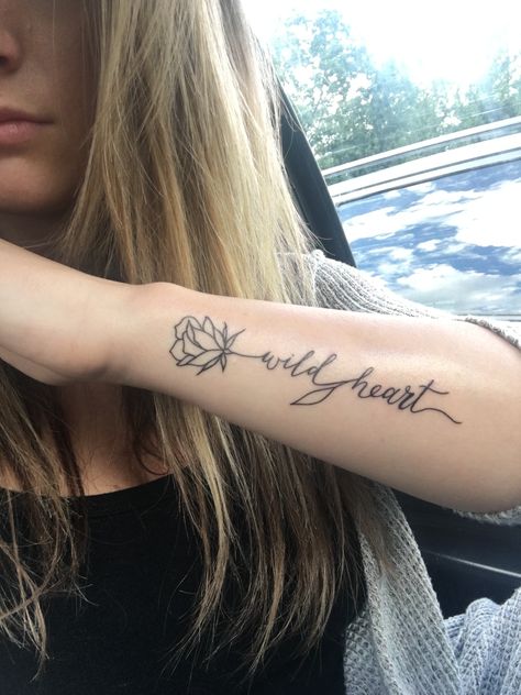 Wild heart rose tattoo.... stevie nicks inspo #sideofarmtattoo#stevienickstattoo#rose Wild Tattoos For Women, Stevie Wonder Tattoo Ideas, Wild Heart Tattoo Ideas, Wild Soul Tattoo, Forearm Script Tattoo Women, Stevie Nicks Tattoo Ideas, Stevie Nicks Inspired Tattoos, Rose With Quote Tattoo, Wild At Heart Tattoo