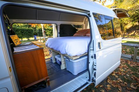 We designed a removable, plywood sleeping platform with storage underneath for our Toyota Hiace van. It’s comfy, it’s warm and we’re delighted that all the pieces actually fit. So… Toyota Hiace Commuter Van Conversion, Van Decoration Ideas, Hiace Van Conversion, Platform With Storage, Dog Camper, Camper Van Decor, 4runner Camping, Renovation Camper, Under Bed Storage Ideas