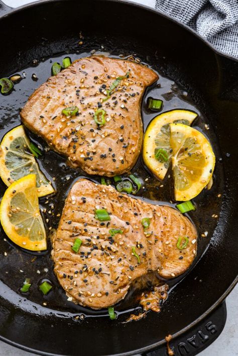 There's no reason to save Tuna Steaks for eating out, make them yourself for a gourmet restaurant experience in the comfort of your home. Not only are they full of healthy nutrients, they are delicious and a real treat any day of the week. Tuna Steaks Recipes Seared, How To Cook Yellowfin Tuna Steak, Seared Yellowfin Tuna Recipe, Keto Tuna Steak, Lemon Tuna Steak, Tun Steak Recipes, Bake Tuna Steak Oven, How To Cook Fresh Yellow Fin Tuna, Tuna Ahi Steak Recipe