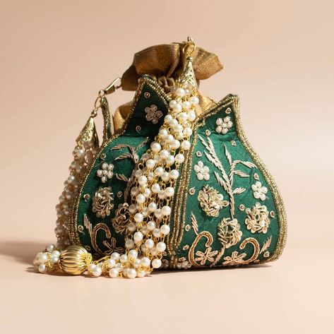 Make a statement with our show stopping lotus shaped potli bag. A unique piece embellished with hand embroidery and finished off with a pearl handle not given not given Silk Lotus Potli Bag, Potli Bag, Embroidered Clutch, Potli Bags, Wedding Clutch, Lighting Setups, Pakistani Jewelry, Sequin Beading, Branded Handbags