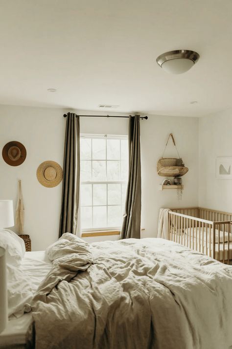 Turn a corner of your bedroom into a mini nursery with a cozy crib, soft rugs, and essential storage solutions. Create a calming space for your baby in your one-bedroom apartment by adding cute wall decals and a small rocking chair for those late-night feedings. Read this article for more tips and tricks! Nursery Guest Room Combo, Apartment Nursery, Nursery Guest Room, Nursery Nook, Baby Corner, Parents Room, Bedroom Updates, Master Room, Shared Bedrooms