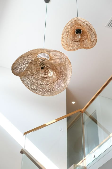 These gorgeous Rattan Pendants from Bisque Traders were the perfect piece for this void at our Woodlands Residence. Not only do they compliment the handrail, but the open weave meant we could cluster 2 pendants without jeopardising the open feel. Interior Styling: Using Rattan Pendants in Hallway - Prince Design Australia #princedesignau Hanging Lamps Staircase, Rattan Pendant Light Hallway, Stair Void Pendant Lighting, Void Pendant Lighting, Pendant Light Over Stairs, Void Lighting Pendants, Hanging Light Staircase, Stairs Pendant Light, Stairwell Pendant Light