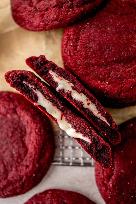 These thick, soft and chewy stuffed red velvet cream cheese cookies have the best flavors of red velvet cake. Stuffed with a tangy, fluffy cream cheese frosting, these cookies are perfect for a gift, cookie swap or holiday event. Cream Horn Cookies, Cream Cheese Stuffed Red Velvet Cookies, Red Velvet Cream Cheese Cookies, Cream Cheese Filled Cookies, Nyc Cookies, Red Velvet Crinkles, Fluffy Cream Cheese Frosting, Cream Cheese Ball, Red Velvet Recipes