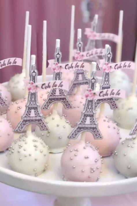 Your guests will be saying 'ooh la la' the second they set their eyes on these elegant Parisian cake pops. Decorated with Effiel Towers and banners saying 'Ooh la la', these cake pops will add some French style to your dessert table! See more party ideas and share yours at CatchMyParty.com Paris Theme Party Centerpieces, Sweet Sixteen Paris Theme Party, Paris Themed 18th Birthday Party, Paris Theme Quince, Paris Themed Birthday Party For Adults, Eiffel Tower Themed Party Paris Birthday, Paris Graduation Theme Party, Quinceanera Paris Theme, Rose Gold Paris Theme Party