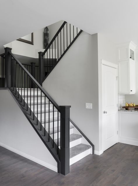 Black And White Staircase With Gray Floors, Light Grey Staircase, Gray Banister Staircases, Grey Staircase, Grey And White Hallway, Grey Hallway Ideas, Scandi Hallway, Black And White Stairs, Tiled Staircase