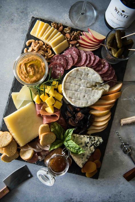 There are so many great pairs in the world of food, but cheese and wine is the best of all to a foodie! Anyone can learn how to build a cheese board, but knowing how to pair each element with your favorite wine is an art. Today, we explore the options that go beautifully with a toasty oak Chardonnay. Wine Pairings, Wine Appetizers, Cheese And Wine, Last Friday Night, Antipasto Platter, Charcuterie Inspiration, Charcuterie Cheese, Charcuterie Platter, Cheese Party