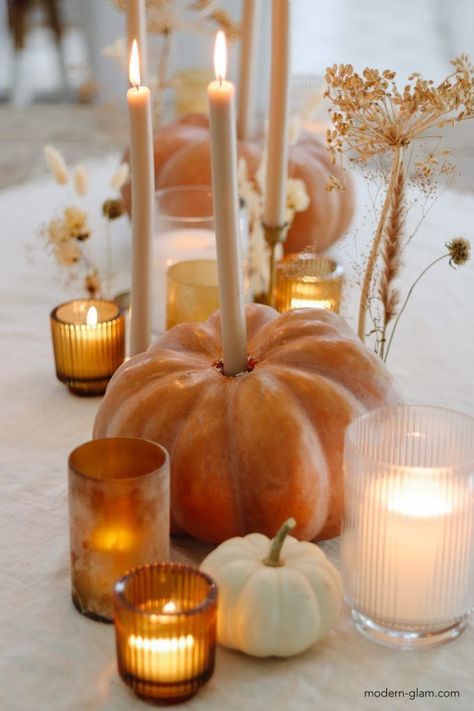 Oct 10, 2021 - These DIY Pumpkin Candle Holders are made with heirloom pumpkins and they make a beautiful centerpiece for your fall table. Diy Pumpkin Candle, Friendsgiving Dinner Party, Table Halloween, Pumpkin Candle Holder, Pumpkin Craft, Fall Brunch, Fall Dinner Party, Fall Thanksgiving Decor, Pumpkin Candles