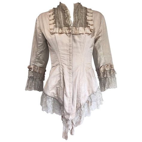 For Sale on 1stdibs - Incredible authentic Victorian Era (approximately 1880s) ivory silk lace corset bustier blouse! Features a fitted boned bodice with hook-and-eye closures Ophelia Core, Victorian Gothic Clothing, Elf Costume Ideas, Ethereal Clothing, Soft Natural Body Type, 1920s Patterns, Fae Dress, Historical Clothing Patterns, Linen Corset