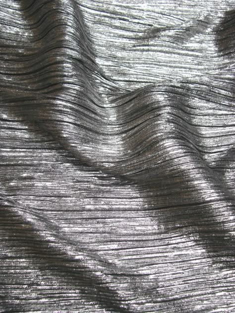 FH-16-O Polyester Silver Metallic Foil Pleated Design  57/58" Wide Fabric Content:  100% Polyester Mechanical Stretch  Country/Region of Manufacture: Korea Color: Black Background/Silver Foil Metallic Print Design, Silver Fabric Texture, Pewter Aesthetic, Metallic Moodboard, Metallic Silver Aesthetic, Silver Astethic, Metallic Fabric Texture, Metallic Aesthetic, Silver Texture