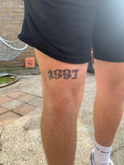 1997 1997 Tattoo Ideas Men, Tattoo Ideas For Men Thighs, Front Thigh Tattoos Men, Mens Quad Tattoo, Lower Thigh Tattoo, Front Leg Tattoo Men, Cool Thigh Tattoos For Men, Front Thigh Tattoo, Upper Leg Tattoo Men