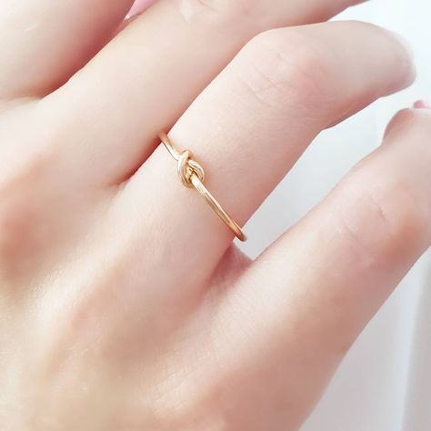 Knot Ring In Solid Gold / 14k / Simple Stacking Gold Ring / Unisex Jewelry / Minimalist Ring / Fine Jewelry / Dainty Ring This ring has a minimal design, and you can wear it any day and combine it with other ring. It makes for an excellent gift for a loved one, without being extravagant. Since the ring is made of pure gold you don't have to remove it when you are washing your hands, washing the dishes etc. * Made to Order * Gold KT: 9K, 14K and 18K Solid Gold * Choice of Gold Color: Rose Gold, Y Minimal Gold Jewelry, Infinity Knot Ring, Gold Knot Ring, Infinity Knot, Gold Ring Designs, Jewelry Dainty, Jewelry Minimalist, Solid Gold Ring, Monogram Jewelry