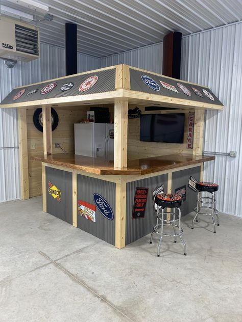 Show of hands - who needs this bar in their garage? Antique wainscoting was used on the fronting - Pole Barn Bar Ideas, Small Garage Bar Ideas, Garage Bar Ideas Man Caves, Man Cave Pole Barn, Corrugated Metal Wainscoting, Barn Bar Ideas, Pole Barn Man Cave, Cool Garage Ideas, Metal Wainscoting