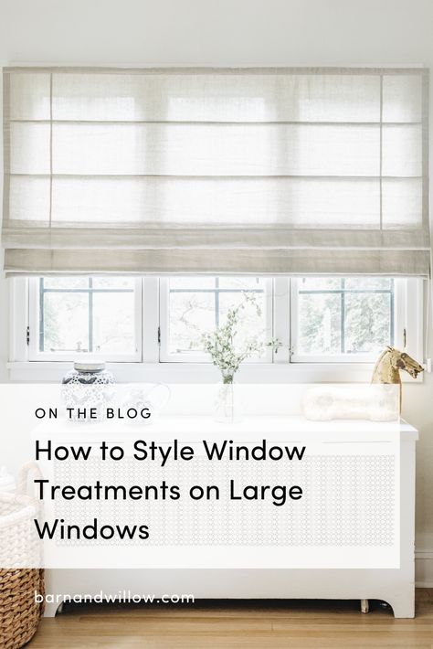 Large windows can be beautiful in a room, styling them however, can be tricky. Here's how to dress up your over-sized windows at home. Window Treatments For Double Windows, Window Treatments For Picture Windows Living Room, Large Blinds For Windows, Blinds For A Picture Window, Curtain Ideas For Long Wide Windows, Shades For Big Windows, Roman Shades Large Windows, Large Window Privacy Ideas, Two Blinds On One Large Window