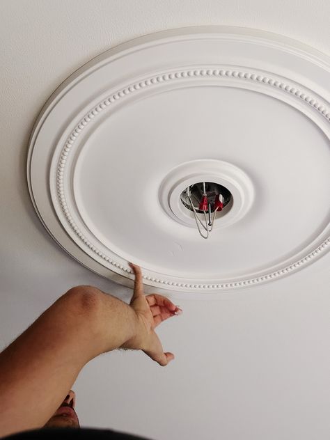 How to Install a Ceiling Medallion - Chris Loves Julia Ceiling Medallions With Ceiling Fans, Ceiling Medallions Living Room, Light Fixture Ceiling Medallion, Ceiling Medallion Ideas, Diy Ceiling Medallion, Bedroom Chandelier Ideas, Modern Ceiling Medallions, Ceiling Medallions Diy, Ceiling Rosette