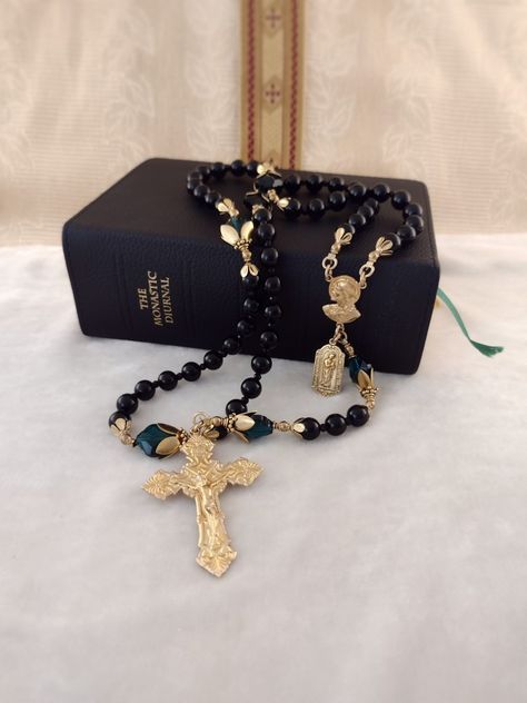 Black rosary with green crystal fleur-dis-lis Pater beads, yellow brass rosary medals and yellow brass leaf capping. St. Jude side medal St Jude, Garden Path, Rosary Catholic, Baroque Style, Baroque Fashion, Austrian Crystal, Raw Brass, Rosary, Black Onyx