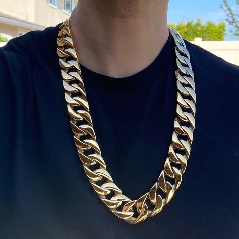 Low Prices Free Shipping Top Quality Cuban Chain 28" x 25MM Super chunky, 25MM wide , 28" long Cuban men's hip hop chain necklace. INSANE size, superior quality, stamped stainless steel, gold finish necklace. Stylish, ultra strong, chunky lobster clamp lock to lock your chan necklace. Ridiculously HEAVY chain necklace weighs over 500+ grams total weight. MONSTER SIZE  chain available for purchase now direct from a USA dealer. Enjoy 100% FREE SHIPPING in the USA. Order now!       Payment Shipping Returns Payment Shipping Returns We accept payment by the following method: Payment We accept most major credit card and Paypal payments. If you don't have a Paypal account, its easy and free to set one up. Feel free to send us a message if you have any questions. We offer 100% FREE shipping  in th Neck Chain For Men, Big Gold Chains, Heavy Chain Necklace, Gold Neck Chain, Bling Ideas, Emma Myers, Gold Cuban Link Chain, Hip Hop Chains, Cuban Link Chain Necklaces