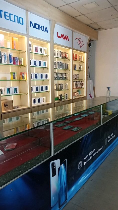 Mobile Shop Display Design, Modern Retail Store Design Exterior, Mobile Showroom Interior Design, Electronic Showroom Interior Design, Mobile Shop Design Interior 3d, Mobile Shop Counter Design, Mobile Shop Design Interior, Store Counter Design, Electronics Store Design