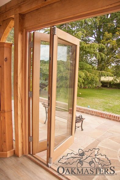 Oak framed extension with glazing and bifold doors - Oakmasters Extension With Bifold Doors, Oak Sunroom, Bifold Doors Onto Deck, Oak Bifolding Doors, Timber Bifold Doors, Oak Bifold Doors, Terrace Door, Internal French Doors Vufold, Dining Room Extension