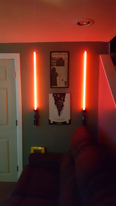 Lightsaber display Starwars Decorations Room, Lightsaber Display Ideas, Lightsaber Display Diy, Star Wars Interior, Lightsaber Decor, Lightsaber Display Wall, Lightsaber Display, Lightsaber Display Shelf, Star Wars Lightsaber Wall Display