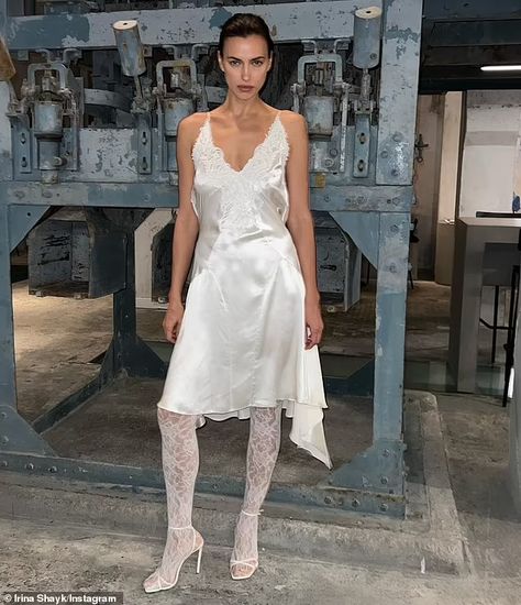 Irina Shayk slips into a silky dress amid claims she is 'happy' with Bradley Cooper | Daily Mail Online White Lace Stockings, White Lace Tights, White Tights Outfit, Dress And Sandals, Magic Night, Lace Stockings, Givenchy Shoes, White Tights, Lace Tights