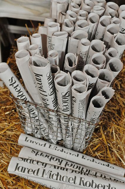 Details by JonesRobertsWedding - Newspaper Programs. I created the file in InDesign and sent it to schoolpaperexpres.... It was unique and pretty inexpensive Newspaper Seating Chart, Newspaper Centerpiece Ideas, Newspaper Table Decor, Wedding Newspaper Display, Newspaper Theme Party, Newspaper Decorations, Newspaper Decor, Avengers Wedding, Newspaper Display