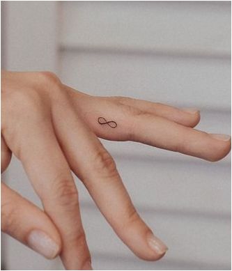 Infinity Eye Catching Finger Tattoo Finger Love Tattoo, Infinity Symbol Finger Tattoo, Infinity Hand Sign Couple, Mini Infinity Tattoo, Tiny Tattoos Infinity, Hand Tattoos Infinity, Infinity Minimalist Tattoo, With You Tattoo, Infinity Hand Tattoo