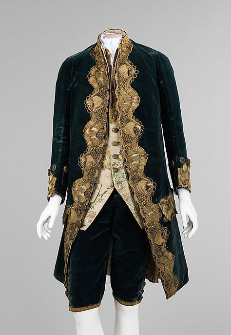 Suit (Frockcoat, waistcoat and breeches), Italian, 1740-1760, silk, metal, cotton, linen. This suit is the epitome of mid-18th century men's wear with its curved jacket front, fitted breeches, narrow sleeves and decorative mid-thigh length waistcoat. Unlike most suits of the period, this suit can be undoubtedly linked through matching buttons on the coat, breeches and waistcoat. 18th Century Mens Fashion, Fashion History Timeline, 1700 Fashion, Rococo Fashion, 18th Century Clothing, Italian Suit, 18th Century Fashion, Frock Coat, Period Outfit