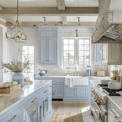 Light and Airy Coastal Kitchen: A Timeless Trend - Lainey May Home Modern Coastal Kitchen Hardware, Luxury Coastal Kitchen, Light Blue Cabinets Kitchen, Pale Blue Kitchen Cabinets, Beach Kitchen Ideas Coastal Colors, Resurface Cabinets, Light Blue Kitchen Ideas, Light Blue Kitchen Cabinets, French Blue Kitchen