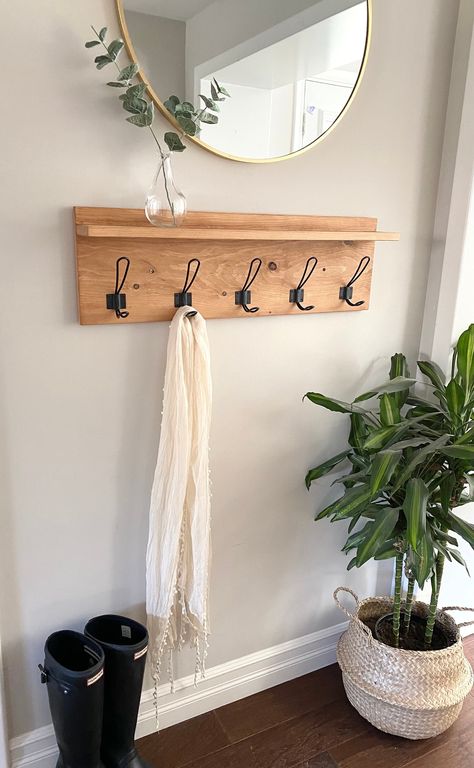 "This beautiful, rustic coat rack is the perfect way to add some simple, elegant charm to your front entryway. You'll be able to hang your coats on the hooks and use the shelf area for other accessories such as wallets, sunglasses, and other decor items. This modern farmhouse entryway organizer is sturdy and the perfect addition to any front hallway. Each coat rack is handcrafted from carefully selected solid pine wood and features high quality stains and materials.  CUSTOMIZE: You can customize Coat Hooks Entryway, Farmhouse Coat Hooks, Small Mudroom Ideas, Modern Farmhouse Entryway, Entryway Coat Rack, Entryway Organizer, Hook Rack, Entryway Organization, Home Entrance Decor