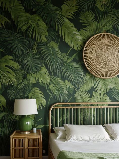 Transform your bedroom into a tropical oasis with a jungle accent wall featuring lush green foliage wallpaper. Complete the look with a bamboo bed frame and stylish rattan furniture pieces for a nature-inspired vibe. Bamboo Bed Frame, Foliage Wallpaper, Bamboo Bed, Tropical Oasis, Bamboo Bedding, Rattan Furniture, Green Foliage, Lush Green, Nature Inspired