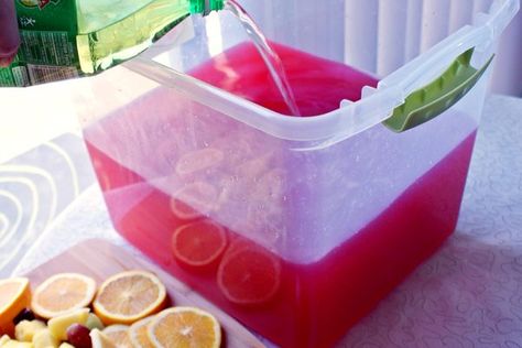 How to Make Killer Trash Can Punch (with Pictures) | eHow Best Jungle Juice Recipe, Trash Can Punch, Trailer Trash Party, Hillbilly Party, Jungle Juice Recipe, Crawfish Boil Party, Trash Party, Jungle Juice, Bridal Shower Food