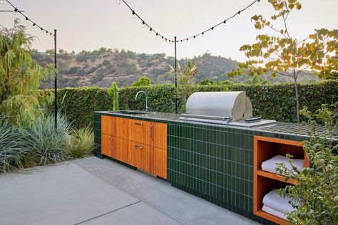 This Tricked-Out, Tiled Outdoor Kitchen Is Better Than Most Indoor Ones Groningen, Tiled Outdoor Kitchen, Outdoor Kitchen Tile, Modern Surf Shack, Brownstone Boys, Outdoor Kitchen Cabinet, Heath Tile, Bamboo Roof, Kitchen Tile Ideas