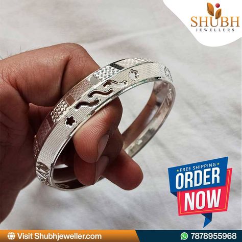 ✅ Customised Name Design ✅ Silver Kada ✅ For Men ✅ 30 gm ✅ Exclusive at Shubh Jewellers Ideal for personal style and elegance, this kada is a meaningful and unique accessory. To shop now with Shubh Jewellers, message us on WhatsApp at 7878955968 or visit our website www.shubhjeweller.com #ShubhJewellers #CustomisedKada #SilverJewelry #MensStyle #ShopNow Kada Designs Silver For Men, Silver Kada For Men, Silver Kada, Silver Chain For Men, Name Design, Timeless Accessories, Design Silver, Chains For Men, Accessories Unique